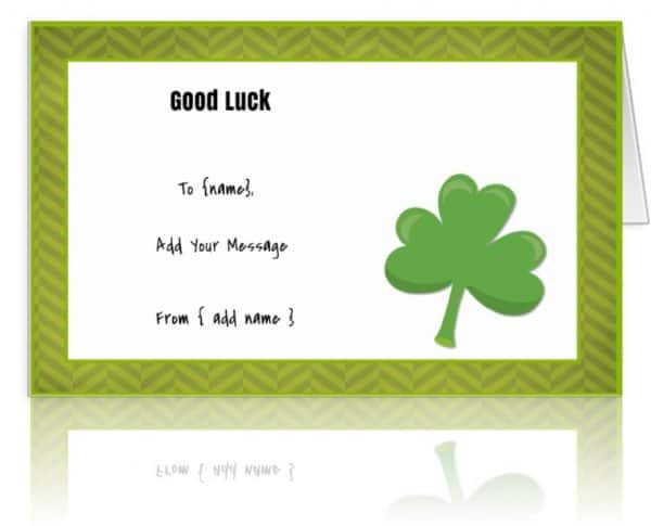 greeting card with green border and clover